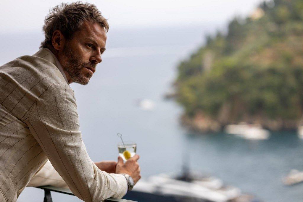 Gilberto Ramerini on a terrace overlooking the Italian coast